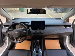 2019 Toyota Corolla 1.2T S-CVT GL, белый — фото 5