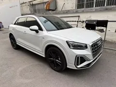 2022 Audi Q2L 35 TFSI, белый — фото 8