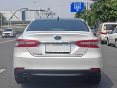 2021 Toyota Camry Hybrid 2.5HG Luxury, белый — фото 5