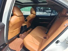 2021 Toyota Camry Hybrid 2.5HG Luxury, белый — фото 9