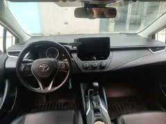 2021 Toyota Corolla TNGA 1.5L CVT, белый — фото 5