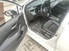 2021 Toyota Corolla TNGA 1.5L CVT, белый — фото 12