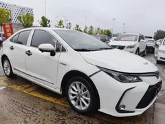 2021 Toyota Corolla 1.8L E-CVT, белый — фото 3
