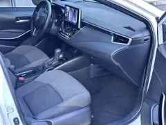 2022 Toyota Levin Hybrid 1.8H E-CVT Leading, белый — фото 7