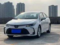 2021 Toyota Corolla 1.8L E-CVT, белый — фото 1