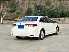 2021 Toyota Corolla 1.8L E-CVT, белый — фото 3