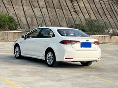 2021 Toyota Corolla 1.8L E-CVT, белый — фото 7
