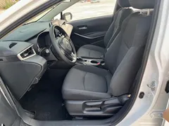 2021 Toyota Corolla 1.8L E-CVT, белый — фото 10