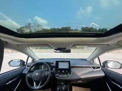 2021 Toyota Corolla 1.8L E-CVT, белый — фото 13
