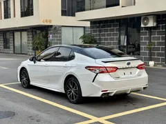 2023 Toyota Camry Hybrid 2.5HS Fashion, белый — фото 7