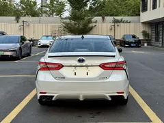 2023 Toyota Camry Hybrid 2.5HS Fashion, белый — фото 8