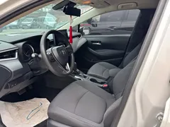 2021 Toyota Corolla TNGA 1.5L CVT, белый — фото 4
