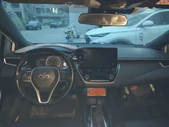 2022 Toyota Levin Hybrid 1.8H E-CVT Leading, белый — фото 5