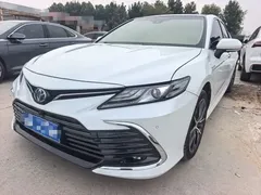 2021 Toyota Camry Hybrid 2.5HG Luxury, белый — фото 1