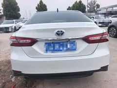 2021 Toyota Camry Hybrid 2.5HG Luxury, белый — фото 9