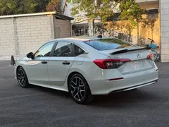 2023 Honda Civic 2.0L e:HEV Hybrid, белый — фото 12