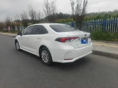 2022 Toyota Corolla 1.8L Hybrid E-CVT, белый — фото 6