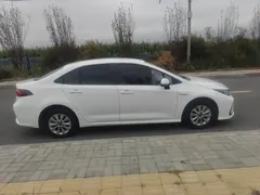2022 Toyota Corolla 1.8L Hybrid E-CVT, белый — фото 8