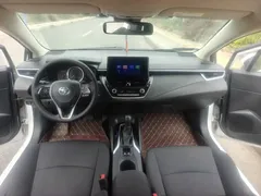 2022 Toyota Corolla 1.8L Hybrid E-CVT, белый — фото 11