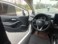 2022 Toyota Corolla 1.8L Hybrid E-CVT, белый — фото 13