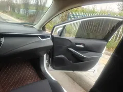 2022 Toyota Corolla 1.8L Hybrid E-CVT, белый — фото 14