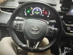 2023 Toyota Corolla 1.8L Hybrid Pioneer, белый — фото 15