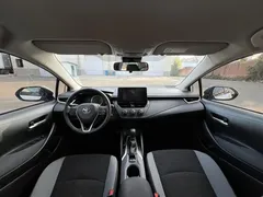 2023 Toyota Corolla 1.2T Pioneer, белый — фото 11