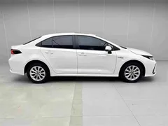 2023 Toyota Corolla 1.8L Hybrid Elite, белый — фото 3