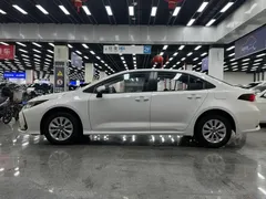 2021 Toyota Corolla 1.2T S-CVT Elite, белый — фото 4