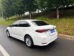 2021 Toyota Corolla 1.2T S-CVT Luxury, белый — фото 5