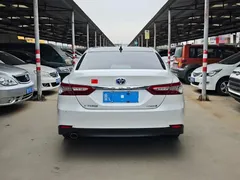 2023 Toyota Camry 2.5HG, белый — фото 9