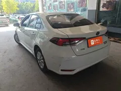 2022 Toyota Corolla 1.8L Hybrid E-CVT, белый — фото 3