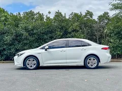 2022 Toyota Levin Hybrid 1.8H E-CVT Leading, белый — фото 6