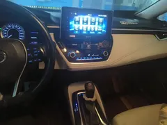 2019 Toyota Corolla 1.2T S-CVT GL-i Luxury, белый — фото 9