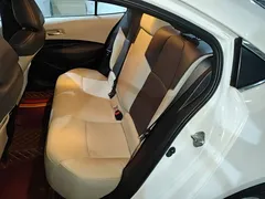 2019 Toyota Corolla 1.2T S-CVT GL-i Luxury, белый — фото 13
