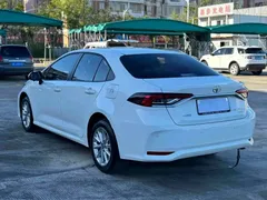 2021 Toyota Corolla 1.2T S-CVT Elite Plus, белый — фото 9