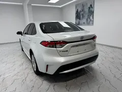 2022 Toyota Levin 185T CVT Luxury, белый — фото 15