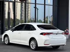 2023 Toyota Corolla 1.2T Elite, белый — фото 10