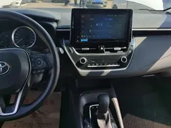 2021 Toyota Corolla 1.2T S-CVT Elite, белый — фото 13