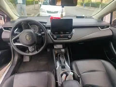 2021 Toyota Corolla TNGA 1.5L CVT Elite, белый — фото 5