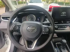 2021 Toyota Corolla TNGA 1.5L CVT Elite, белый — фото 6