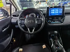 2021 Toyota Corolla 1.2T S-CVT Elite, белый — фото 6