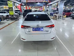 2021 Toyota Corolla 1.2T S-CVT Elite, белый — фото 7