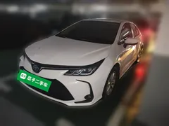 2021 Toyota Corolla Hybrid 1.8L E-CVT Elite, белый — фото 1