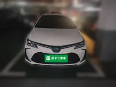 2021 Toyota Corolla Hybrid 1.8L E-CVT Elite, белый — фото 2