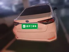 2021 Toyota Corolla Hybrid 1.8L E-CVT Elite, белый — фото 3