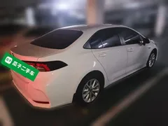 2021 Toyota Corolla Hybrid 1.8L E-CVT Elite, белый — фото 4