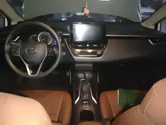 2021 Toyota Corolla Hybrid 1.8L E-CVT Elite, белый — фото 5