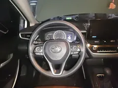 2021 Toyota Corolla Hybrid 1.8L E-CVT Elite, белый — фото 6