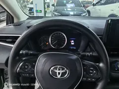 2021 Toyota Corolla TNGA 1.5L CVT Pioneer, белый — фото 10